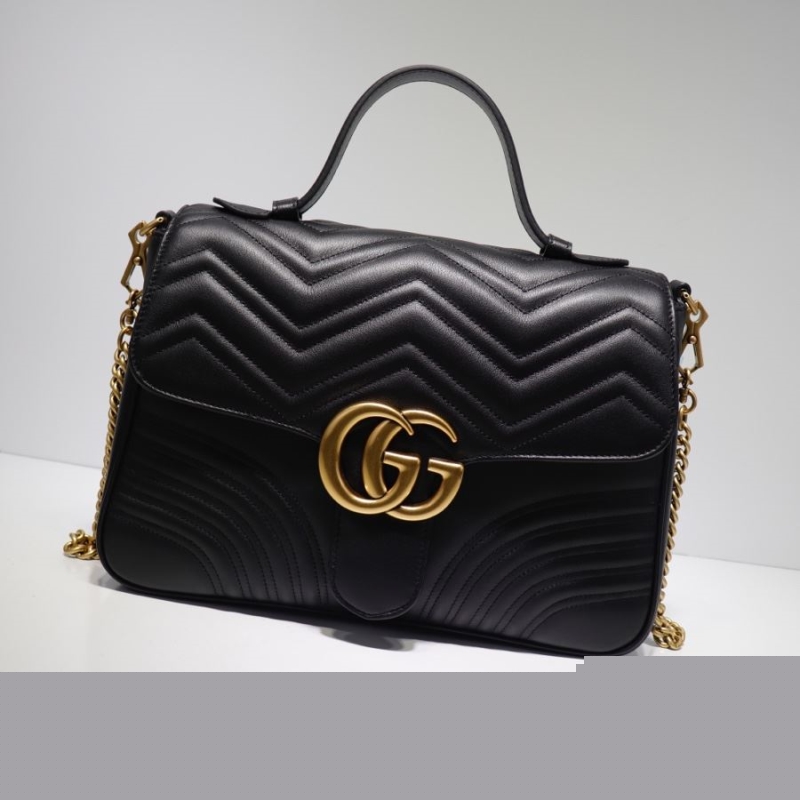 G*u*i top handle bags